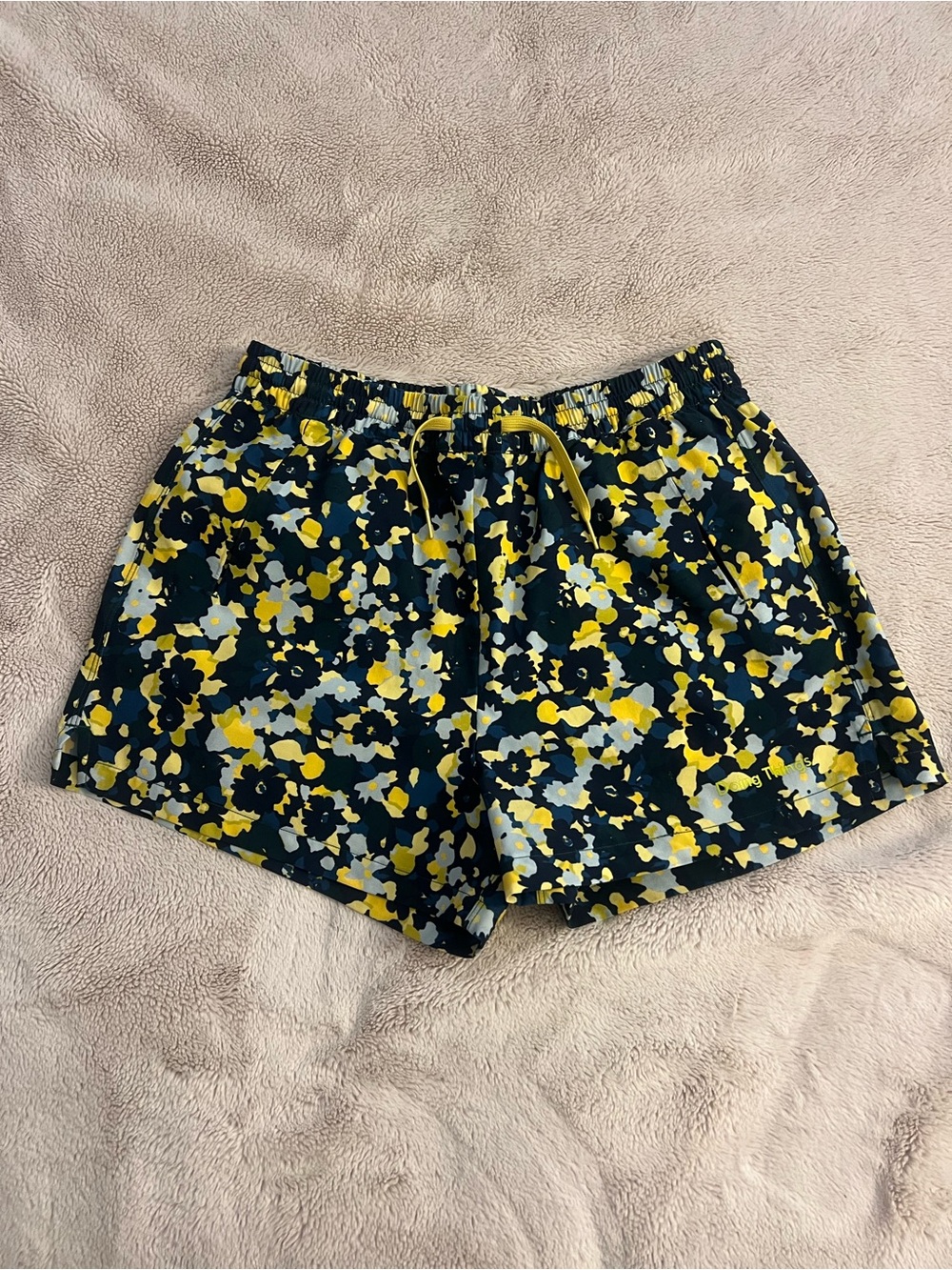 Outdoor Voices Navy Floral Athletic Shorts with Yellow Drawstring